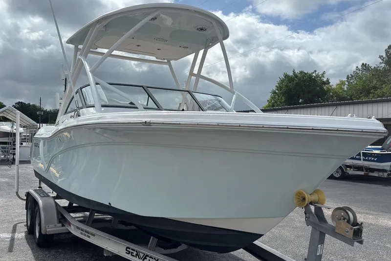 Slide: The Image of 2019 Sea Fox 226 Traveler boat on trailer under cloudy sky. - 8