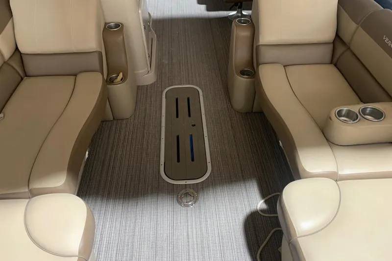 Slide: The Image of Luxurious seating on 2019 Veranda Relax VR25RC boat with cup holders and sleek flooring. - 14