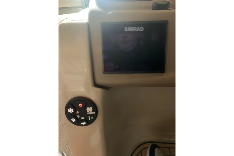 Slide: The Image of Control panel of 2019 Veranda Relax VR25RC with Simrad display and Ultraflex controls. - 17