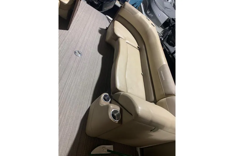 Slide: The Image of Luxurious seating on 2019 Veranda Relax VR25RC pontoon boat with cup holders. - 19