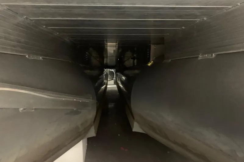 Slide: The Image of Underneath view of 2019 Veranda Relax VR25RC pontoon boat, showcasing structural details. - 21