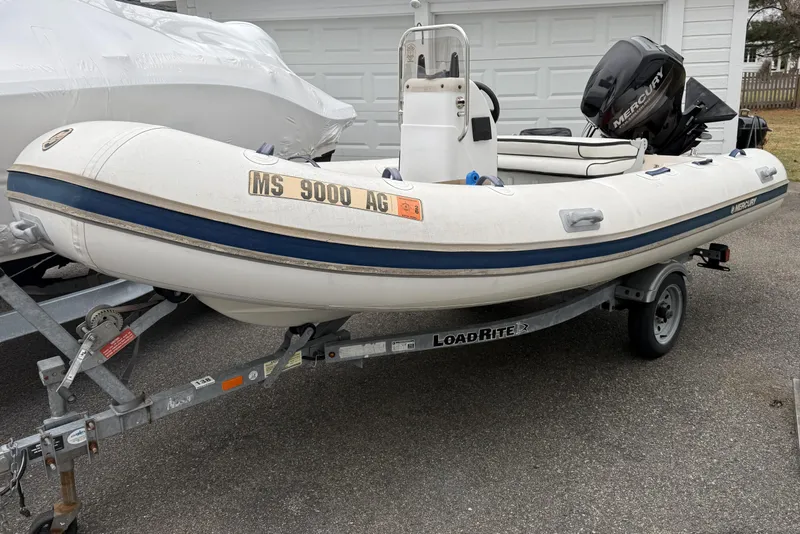 Slide: The Image of 2016 Quicksilver Center Console boat on trailer with Mercury engine. - 6
