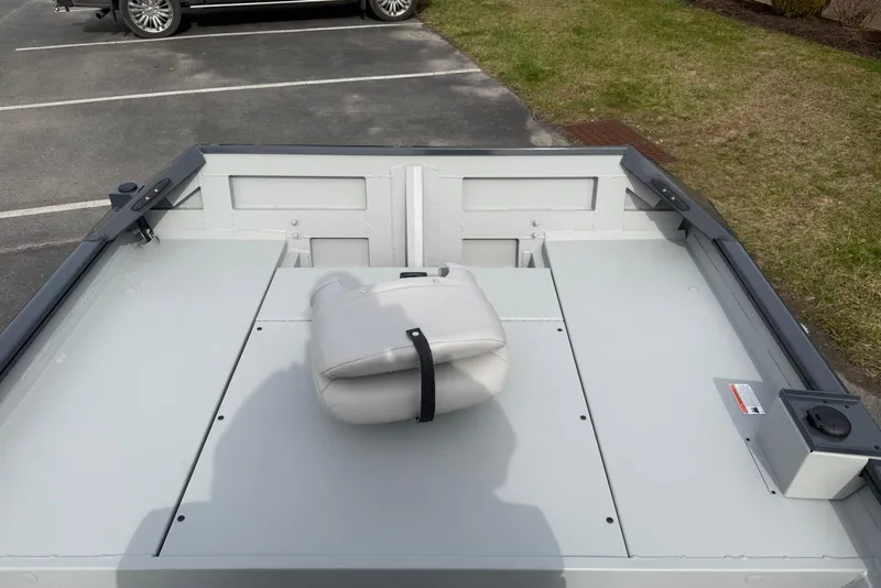 Slide: The Image of 2026 Crestliner 1760 Retriever FCC boat interior with seating and storage compartments. - 9