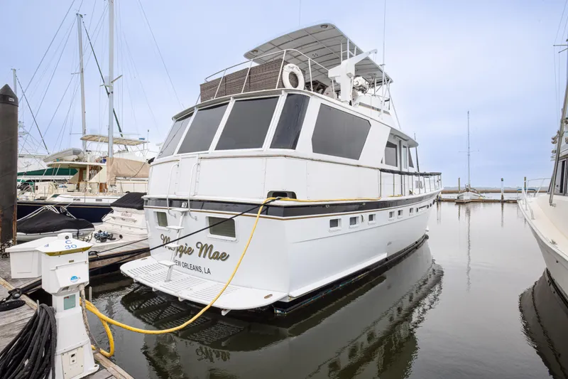 Slide: The Image of 1980 Hatteras 53 Motor Yacht docked at marina, rear view. - 17