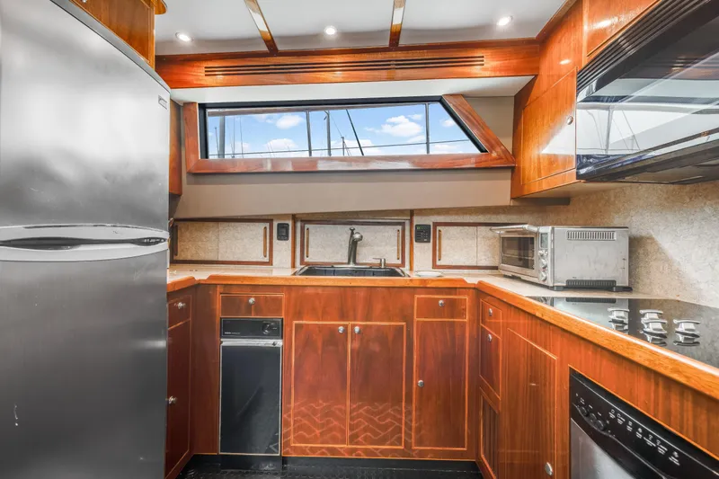 Slide: The Image of Luxurious kitchen interior of 1980 Hatteras 53 Motor Yacht with modern appliances. - 76
