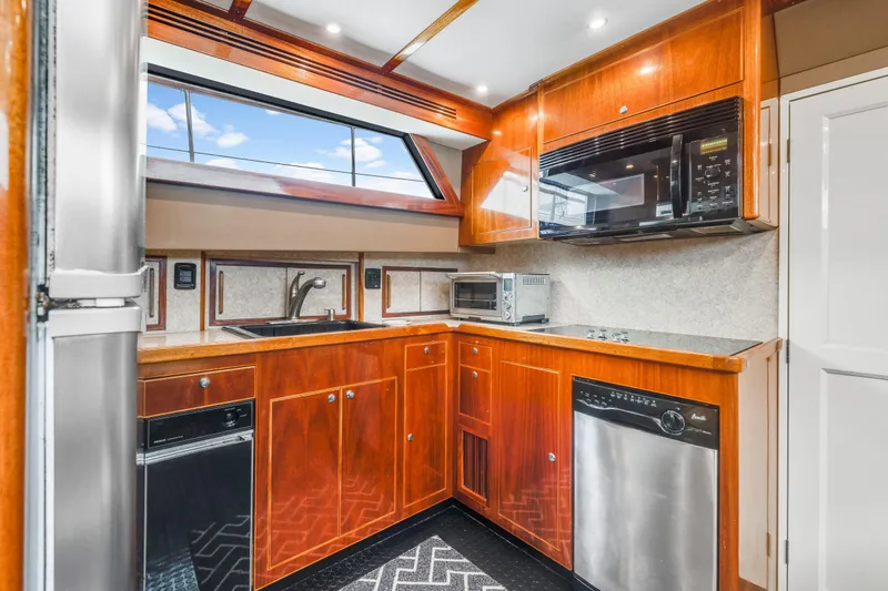 Slide: The Image of Luxurious kitchen interior of 1980 Hatteras 53 Motor Yacht with modern appliances. - 78