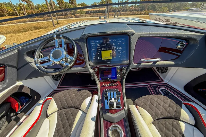 Slide: The Image of Cockpit of 2018 MTI 340X boat with modern steering and digital dashboard. - 16