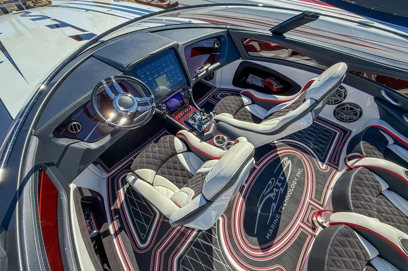 Slide: The Image of Luxurious interior of 2018 MTI 340X boat with modern dashboard and seating. - 17