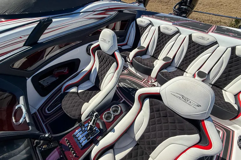 Slide: The Image of Luxurious interior of a 2018 MTI 340X boat with stylish seating and controls. - 20
