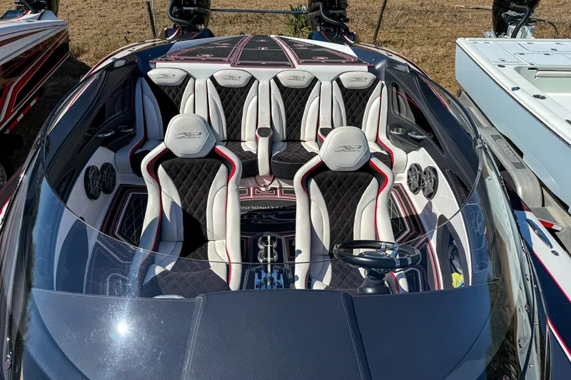 Slide: The Image of 2018 MTI 340X boat interior with sleek, modern design and luxurious seating. - 28