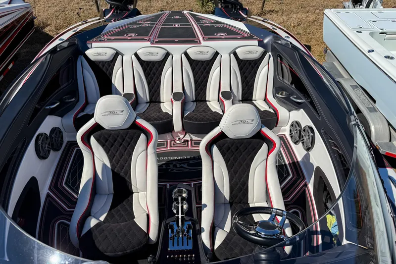 Slide: The Image of 2018 MTI 340X boat interior with luxurious seating and modern design. - 29