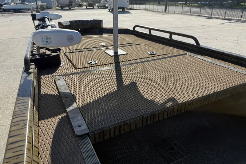 Slide: The Image of 2022 Prodigy 1854 boat deck with textured surface and mounted equipment. - 7