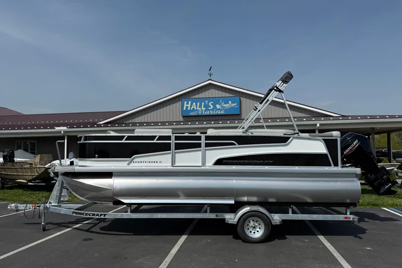 The Image of 2025 Princecraft Sportfisher 21-2S pontoon boat on trailer at Hall's Marine. - 0