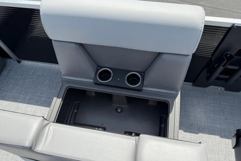 Slide: The Image of 2025 Princecraft Sportfisher 21-2S boat seat with cup holders and storage compartment. - 14