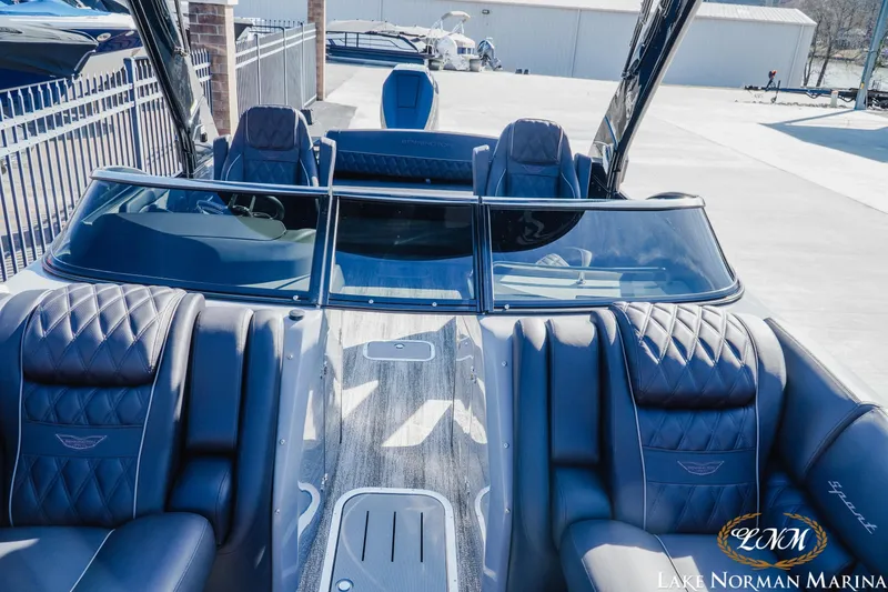 Slide: The Image of 2025 Bennington 25QSBWA luxury pontoon boat interior at Lake Norman Marina. - 16