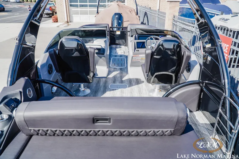 Slide: The Image of 2025 Bennington 25QSBWA pontoon boat interior at Lake Norman Marina. - 6