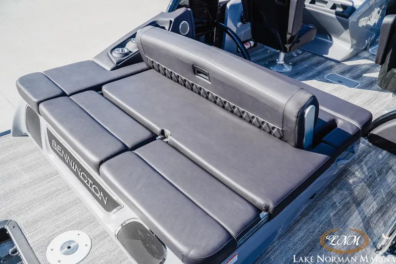 Slide: The Image of 2025 Bennington 25QSBWA boat interior with luxurious seating and modern design. - 7