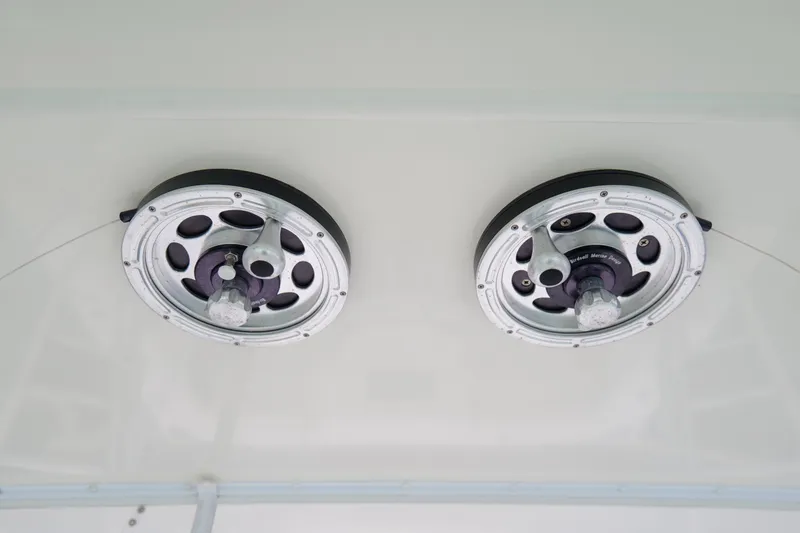 Slide: The Image of Ceiling-mounted marine speakers on a 1998 Cabo 45 Express boat. - 16