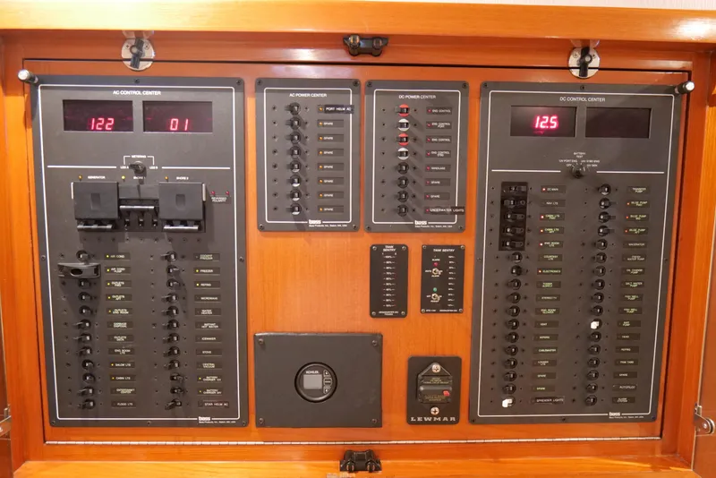 Slide: The Image of Electrical control panel on a 1998 Cabo 45 Express boat. - 33