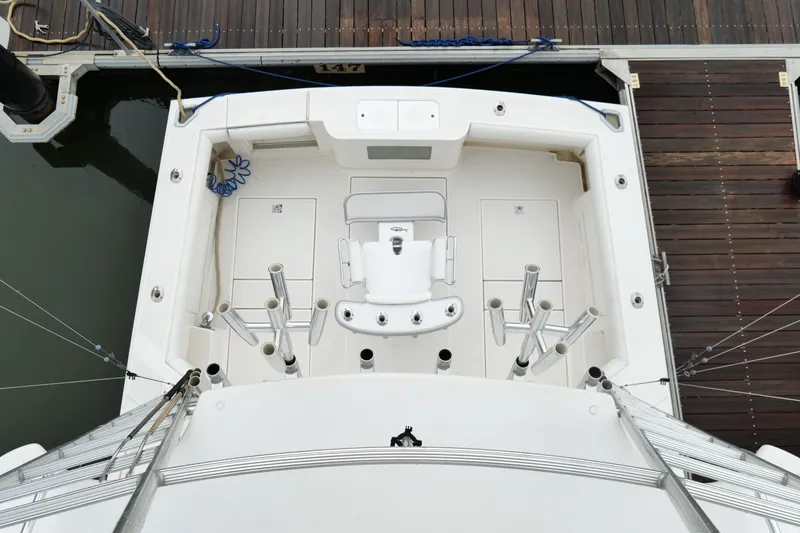 Slide: The Image of Overhead view of 1998 Cabo 45 Express boat docked at marina. - 41