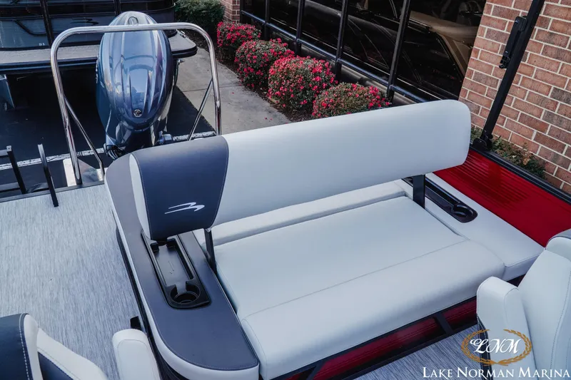 Slide: The Image of 2026 Bennington 22SSB pontoon boat with sleek seating and modern design at Lake Norman Marina. - 15