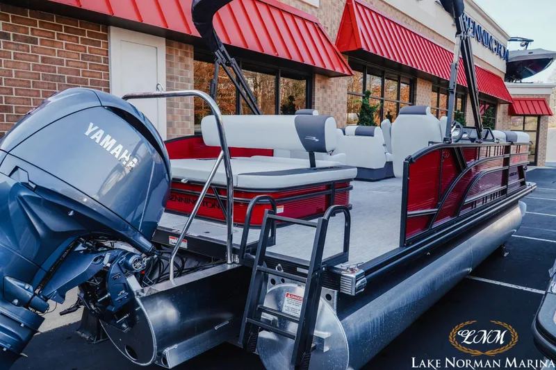 Slide: The Image of 2026 Bennington 22SSB pontoon boat with Yamaha engine at Lake Norman Marina. - 3