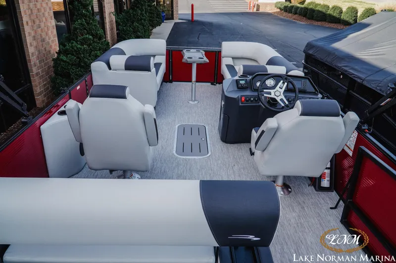 Slide: The Image of 2026 Bennington 22SSB pontoon boat interior with plush seating and modern helm. - 4