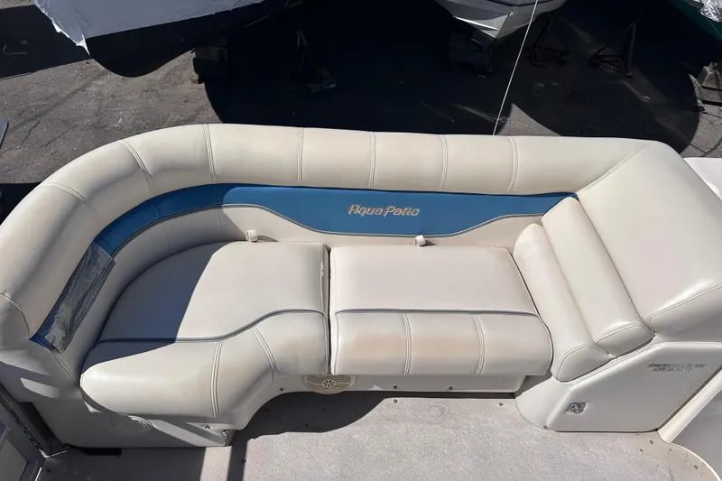 Slide: The Image of 2007 AquaPatio AP 180 RE-3 Gate boat seating with white and blue upholstery. - 3