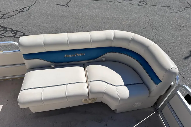 Slide: The Image of 2007 AquaPatio AP 180 RE-3 Gate boat seating with blue and white upholstery. - 4