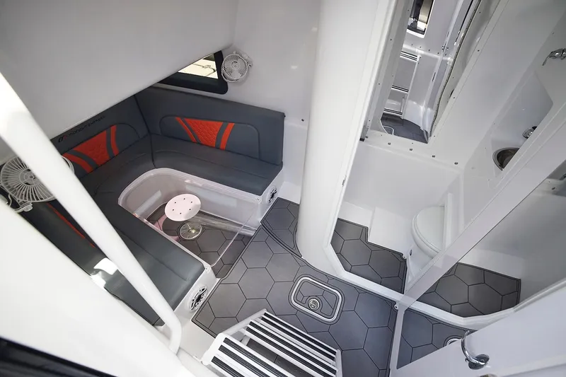 Slide: The Image of Luxurious interior of 2022 Midnight Express 43 Open boat with seating and bathroom. - 19