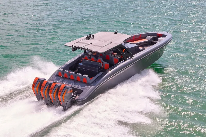 Slide: The Image of 2022 Midnight Express 43 Open boat cruising on water with powerful engines. - 2