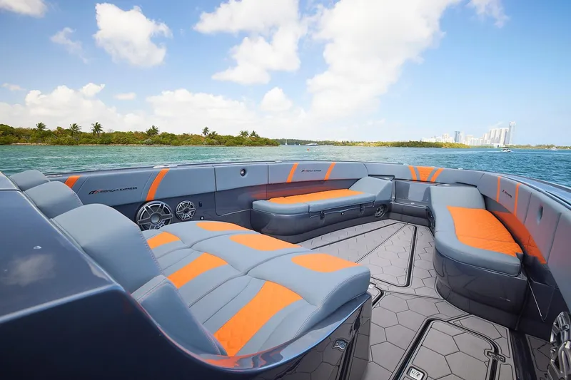 Slide: The Image of 2022 Midnight Express 43 Open boat with stylish seating on a sunny day. - 9