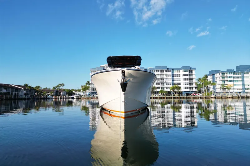 Slide: The Image of Lilybaeum Lipari 31 yacht docked in a serene marina, 2026 model. - 11