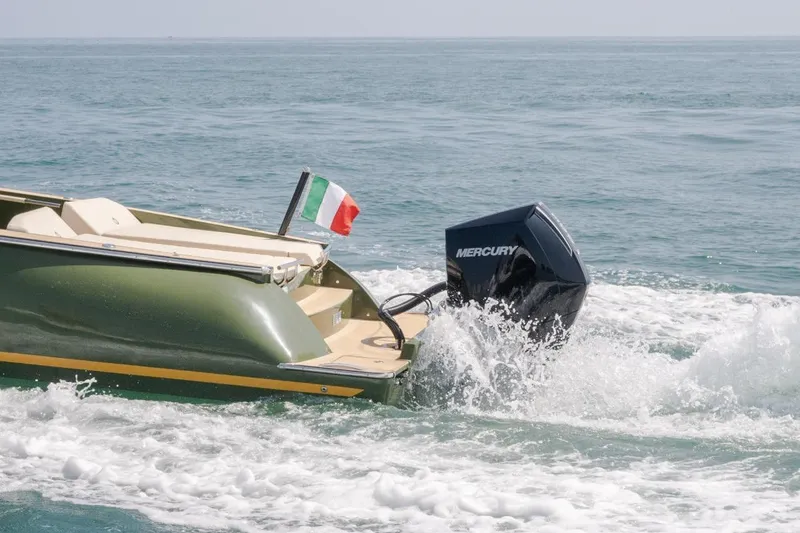 Slide: The Image of 2026 Lilybaeum Levanzo 25 Lounge Deck boat with Mercury engine on open water. - 12
