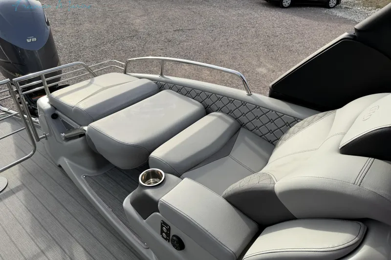 Slide: The Image of Luxurious seating on 2022 Manitou 27 LX SRW pontoon boat with V8 engine. - 20