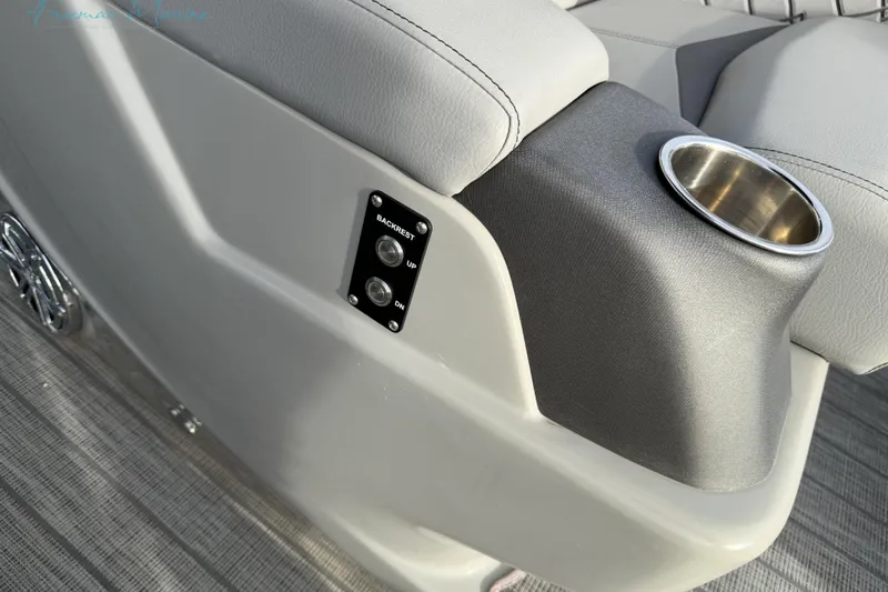 Slide: The Image of 2022 Manitou 27 LX SRW boat seat with adjustable backrest and cup holder. - 22