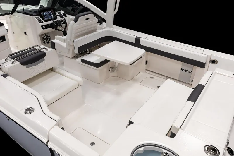 Slide: The Image of Manufacturer Provided Image: 2026 Robalo R277 Dual Console boat interior with white seating and modern dashboard. - 7