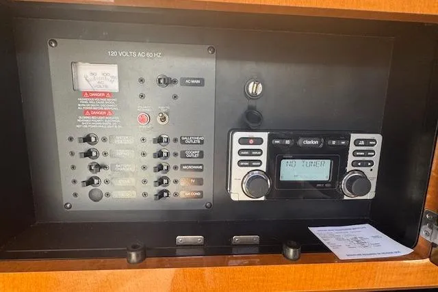 Slide: The Image of Control panel of a 2011 Chaparral 270 Signature boat with Clarion audio system. - 17