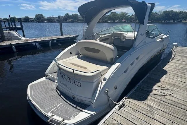 Slide: The Image of 2011 Chaparral 270 Signature boat docked on a sunny day. - 5