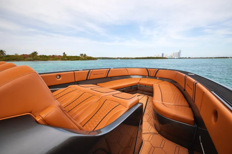 Slide: The Image of Luxurious 2024 Midnight Express 43 Solstice boat interior with tan leather seating, ocean view. - 10