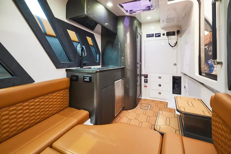 Slide: The Image of Luxurious interior of 2024 Midnight Express 43 Solstice boat with modern amenities and seating. - 21