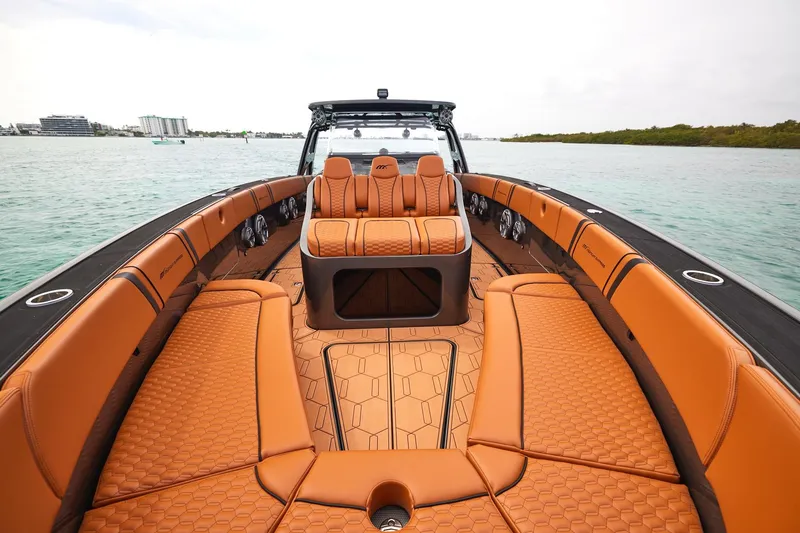 Slide: The Image of Luxurious interior of 2024 Midnight Express 43 Solstice boat with tan leather seating. - 7