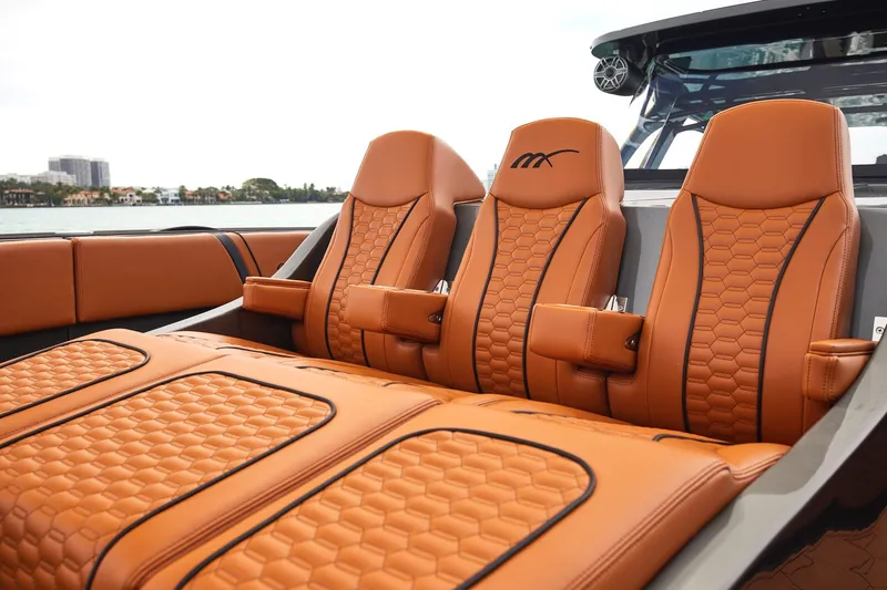 Slide: The Image of Luxurious leather seating on 2024 Midnight Express 43 Solstice boat, featuring elegant design and craftsmanship. - 9