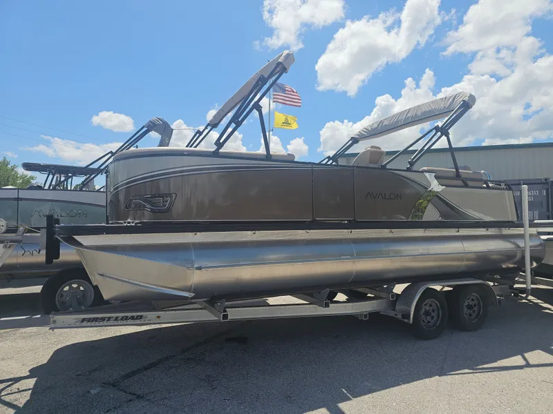 The Image of 2026 Avalon LSZ 2385 Quad Lounger Tritoon on trailer. - 0