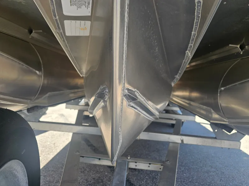 Slide: The Image of Underside of a 2026 Avalon LSZ 2385 Quad Lounger Tritoon. - 15