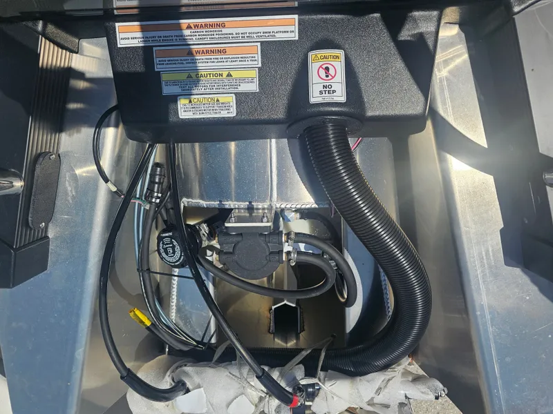 Slide: The Image of Engine compartment of Avalon LSZ 2385 QUAD LOUNGER TRITOON 2026. - 23