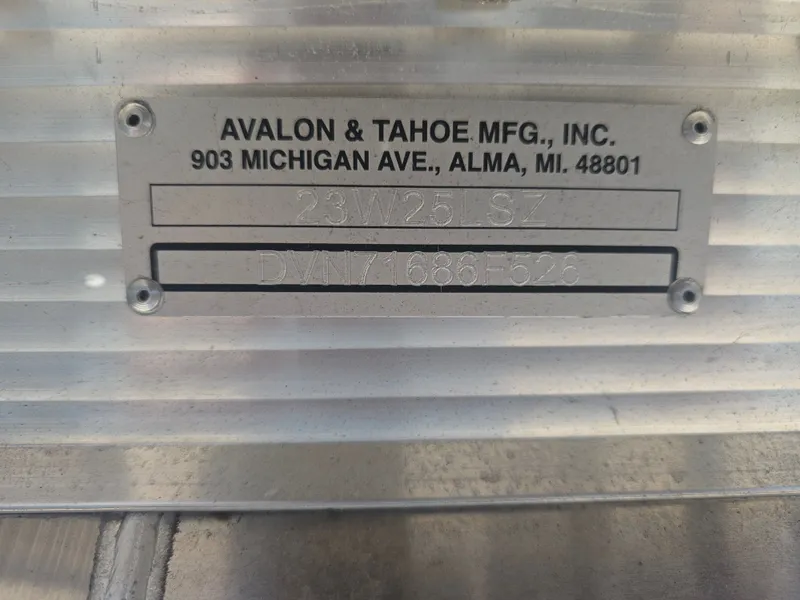 Slide: The Image of Metal plate from Avalon & Tahoe MFG, Inc. with serial number. - 34