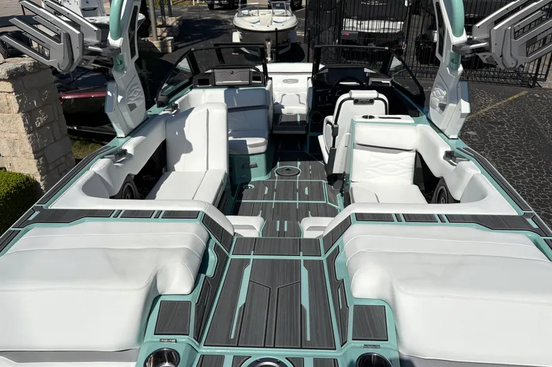 Slide: The Image of 2026 Supra SA 550 boat interior with luxurious white seating and modern design. - 15