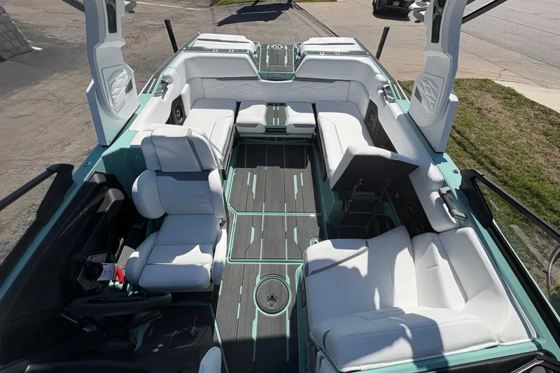 Slide: The Image of 2026 Supra SA 550 boat interior with white seating and modern design. - 23