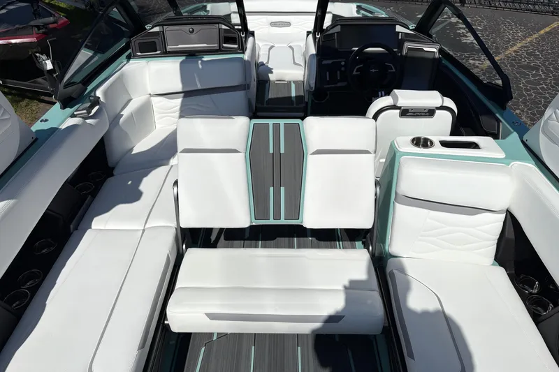 Slide: The Image of 2026 Supra SA 550 boat interior with white seating and modern dashboard design. - 28